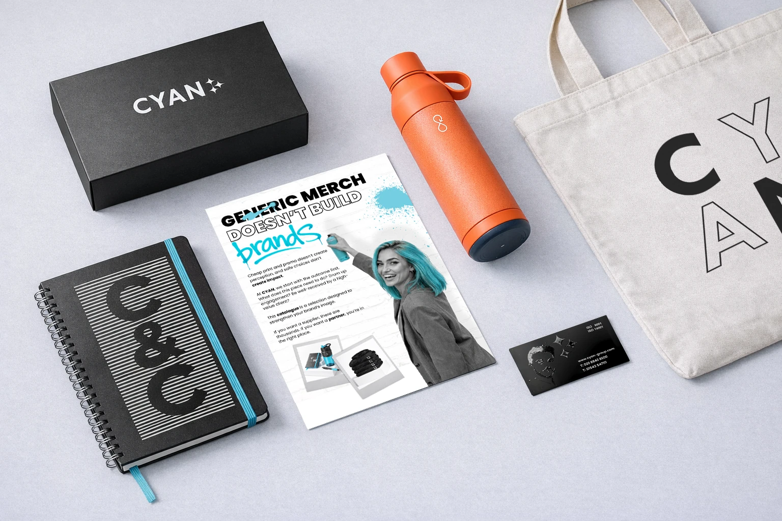A coordinated physical campaign combining branded merchandise, print and packaging.