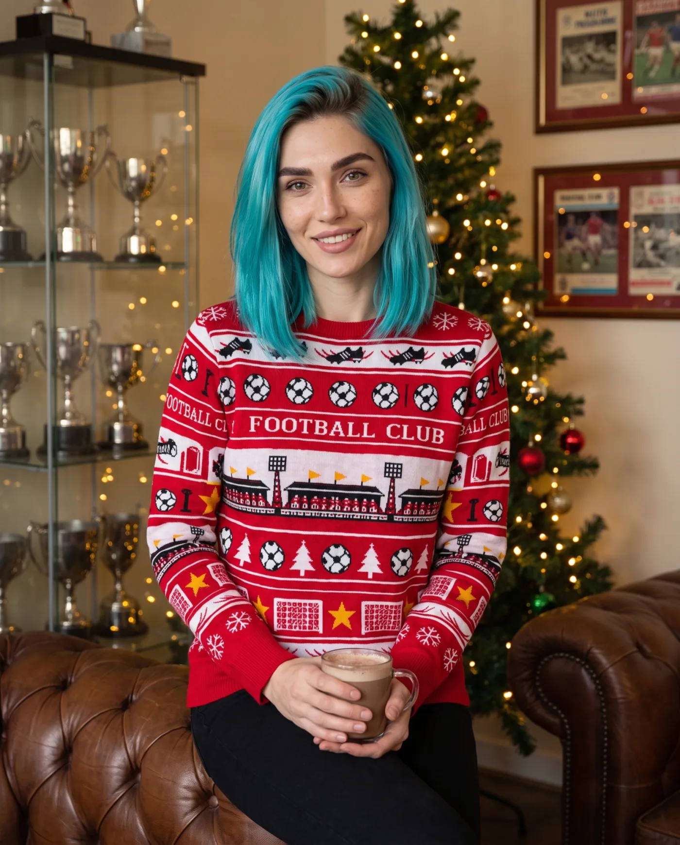 Custom football club Christmas jumper featuring club landmarks and colours.